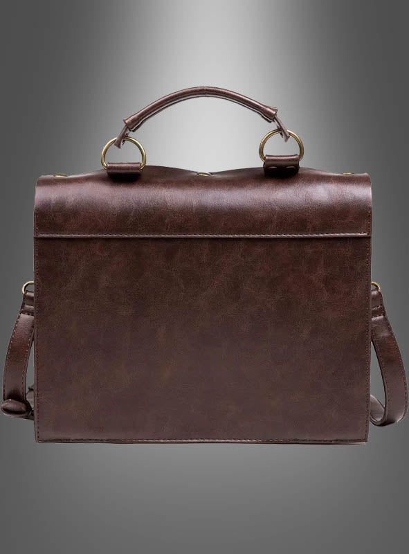 Steampunk-Handtasche 26 cm mit Uhr – eine braune Ledertasche im Aktentaschenstil mit Tragegriff und Schulterriemen – fotografiert vor einem grauen Hintergrund mit Farbverlauf.