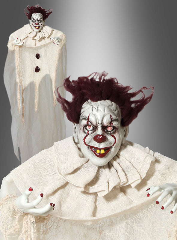 Die Halloween-Hängedekoration „Böser Clown“ (130 cm) besticht durch ein weißes Gesicht, eine rote Nase, gezackte gelbe Zähne und zerzaustes Haar und trägt ein zerfetztes weißes Kostüm – damit ist sie die ideale Halloween-Dekoration. Dieser gruselige hängende Clown wird vor einem grauen Hintergrund mit Farbverlauf präsentiert, um sein unheimliches Aussehen noch zu unterstreichen.
