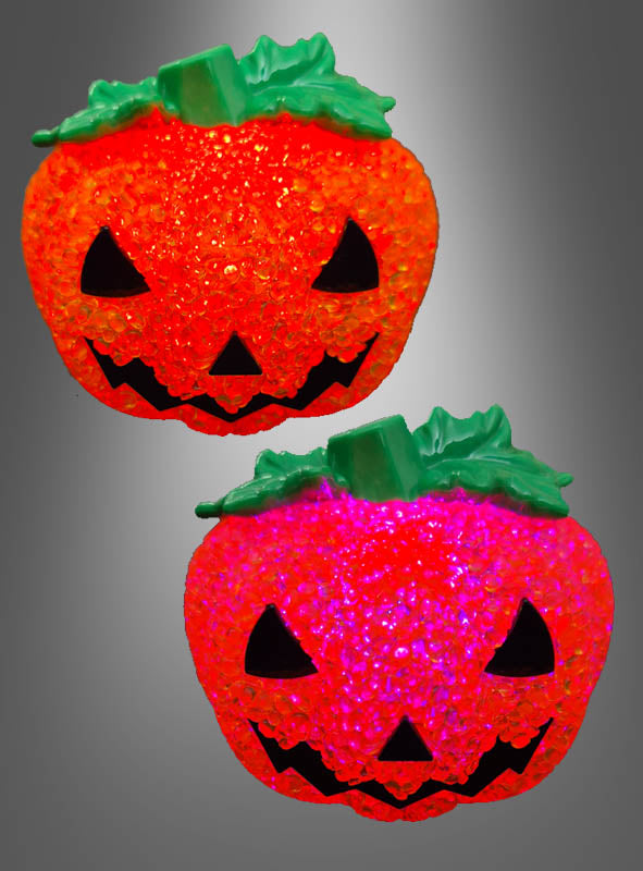 Auf einem grauen Hintergrund mit Farbverlauf sind zwei leuchtende Halloween-Kürbisse mit Farbwechsel zu sehen, die jeweils grüne Stiele und Blätter sowie gezackte schwarze Augen, Nasen und Münder aufweisen. Diese Figuren eignen sich perfekt als Halloween-Tischdekoration und sorgen mit ihren farbwechselnden LED-Lichtern für eine festliche Atmosphäre.
