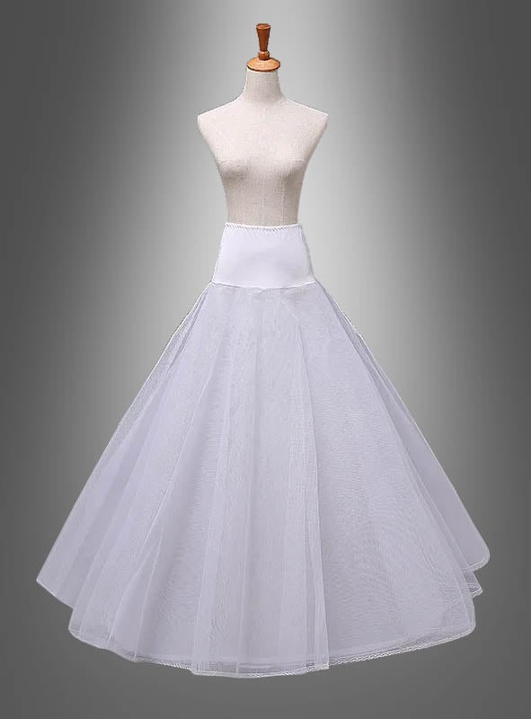 Eine weiße Schaufensterpuppe präsentiert den „Langer Reifrock Petticoat“ mit einem eng anliegenden Bund und einem ausgestellten Tüllrock vor einem grau verlaufenden Hintergrund.
