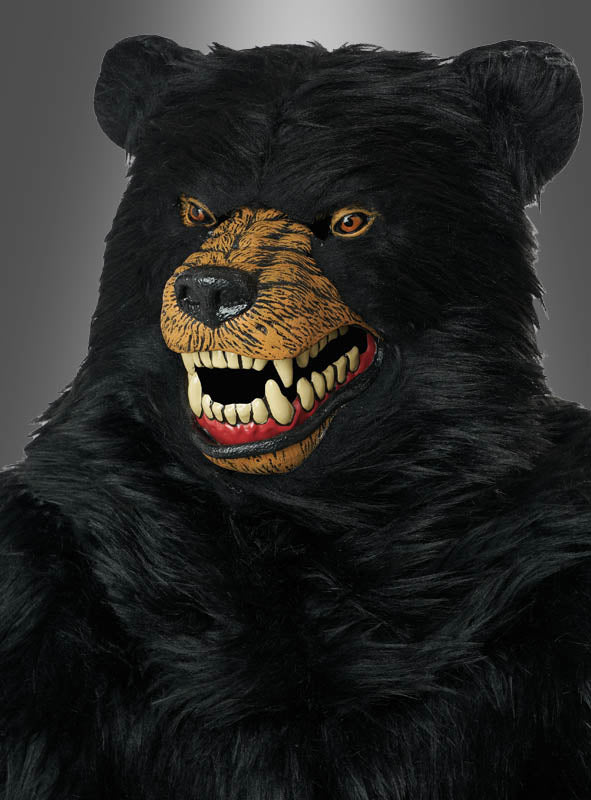 Eine Person, die die „Schwarzbär Maske Animotion lebensecht“ trägt – eine realistische Bärenmaske mit übertrieben cartoonartigen, scharfen Zähnen und ausdrucksstarken Augen –, posierte vor einem schlichten grauen Hintergrund. Diese auffällige Maske verfügt über die Ani-Motion-Technologie für noch mehr Ausdruckskraft.