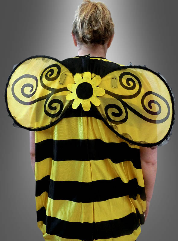 Eine Person, die das „Darling“-Bienenkostüm trägt – mit auffälligen gelben und schwarzen Streifen, großen, verzierten Bienenflügeln und einem bezaubernden Blumendetail –, von hinten fotografiert – eine ideale Wahl für jede Karnevalsveranstaltung.