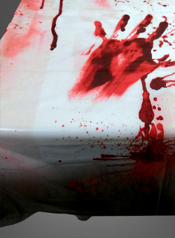 Die „Blutige Tischdecke“ als Halloween-Dekoration besticht durch eine weiße Oberfläche, die mit roten Handabdrücken und Spritzern verziert ist, die an Blutflecken erinnern – damit ist sie die ideale Wahl für Ihre nächste Halloween-Dekoration.