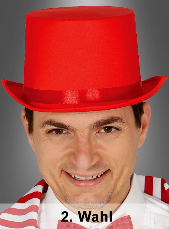 Ein Mann, der einen knallroten „2. Wahl“-Zylinderhut und ein weißes Hemd mit roten Streifen trägt, lächelt in die Kamera; am unteren Bildrand ist der Schriftzug „2. Wahl“ zu sehen.
