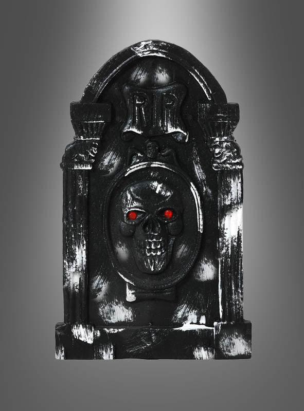 Das „Grabstein Halloween – Verschiedene Designs“-Set besteht aus einem schwarzen Grabstein-Requisit mit einem Totenkopf und leuchtend roten Augen, auf dessen Oberseite „RIP“ eingraviert ist, vor einem grauen Hintergrund mit Farbverlauf – perfekt als Halloween-Dekoration und als auffälliger Grabstein für Ihre gruselige Dekoration.