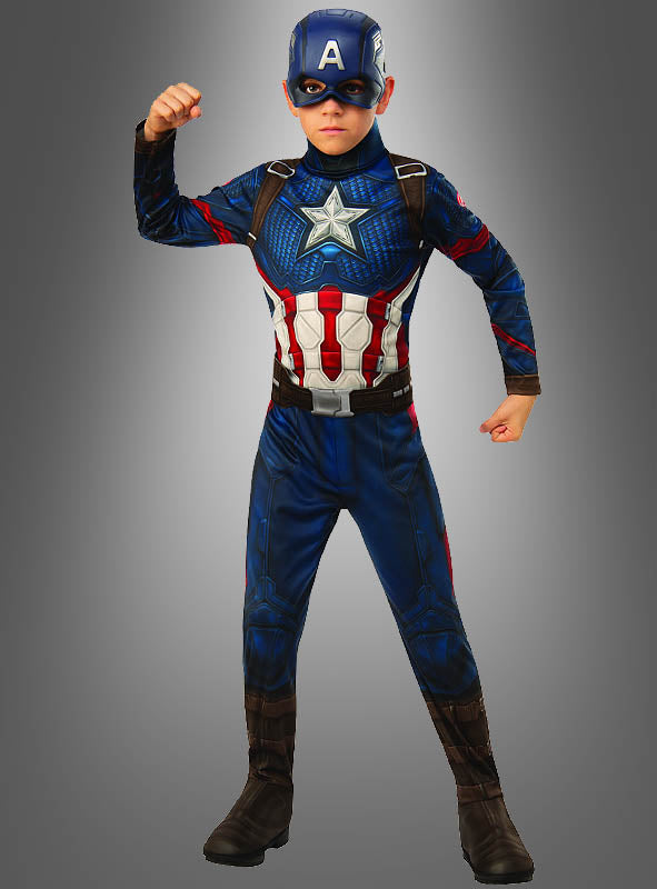 Ein Kind im Captain-America-Endgame-Kinderkostüm, das mit angewinkeltem Arm und erhobener Faust vor einem schlichten grauen Hintergrund steht – ideal für Fans, die ein authentisches Marvel-Lizenzkostüm suchen.