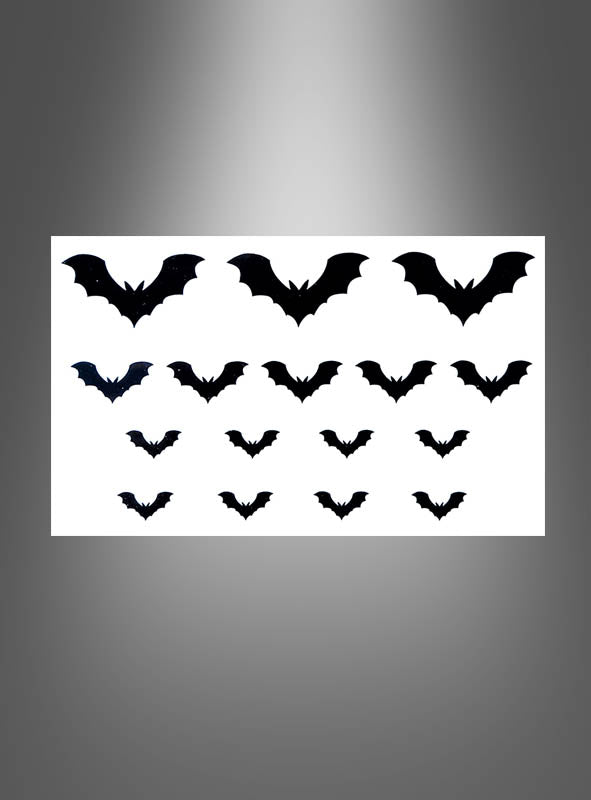 Diese „Tattoos Spinne oder Fledermaus“ (je 32 Stück) zeigen 32 Fledermaussilhouetten in verschiedenen Größen auf weißem Hintergrund, angeordnet in drei Reihen mit einem grauen Farbverlaufsrand, und eignen sich perfekt als Tattoo-Abziehbilder oder Hautaufkleber, um Ihrer Haut einen kreativen Touch zu verleihen.