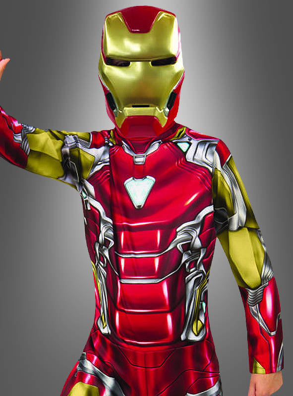 Ein Kind, das das Iron-Man-Kinderkostüm aus „Avengers: Endgame“ trägt – in den Farben Rot und Gold und mit einem Helm –, posiert vor einem grauen Hintergrund mit Farbverlauf. Dieses detailreiche Marvel-Lizenzkostüm ist ideal für junge Avengers-Fans, die ihren Helden aus „Avengers: Endgame“ verkörpern möchten.