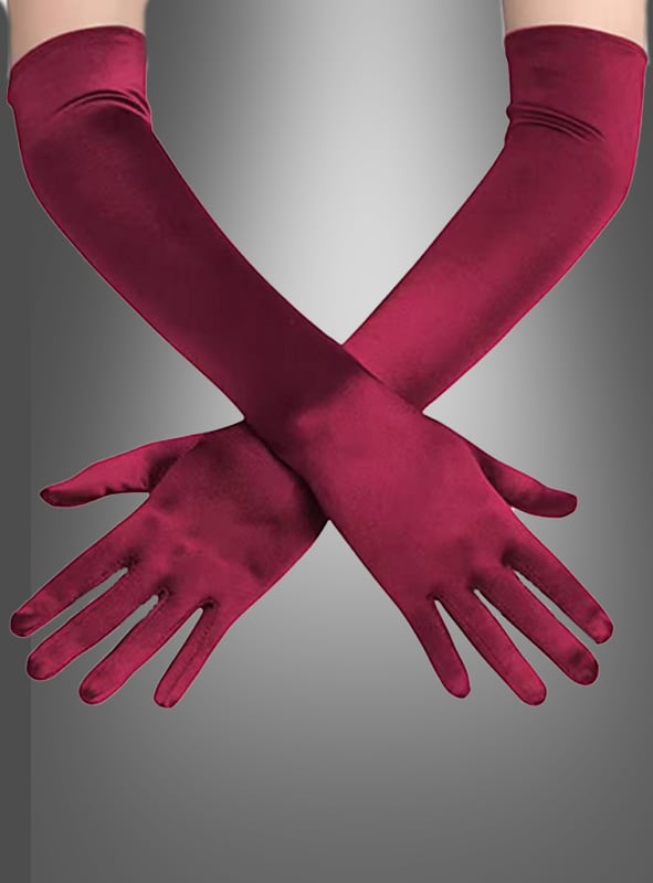 Vor einem grauen Hintergrund mit Farbverlauf sind zwei Arme mit langen, roten Satinhandschuhen verschränkt, wodurch die eleganten Satinhandschuhe in verschiedenen Farben zur Geltung kommen.