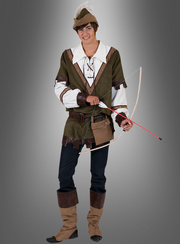 Eine Person, die ein Robin-Hood-Kostüm für Herren trägt – bestehend aus einer mittelalterlich anmutenden Bogenschützen-Montur mit grüner Tunika, Stiefeln und Hut –, steht vor einem grauen Hintergrund mit Farbverlauf und hält Pfeil und Bogen in der Hand.