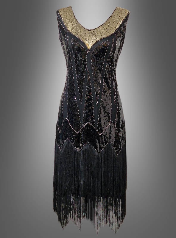 Figurbetontes Paillettenkostüm „Mary“ im Stil der 20er Jahre – ein ärmelloses schwarzes Flapperkleid mit silbernem Ausschnitt und Fransen am Saum, inspiriert vom klassischen Charleston-Paillettenkleid, präsentiert vor einem schlichten grauen Hintergrund.