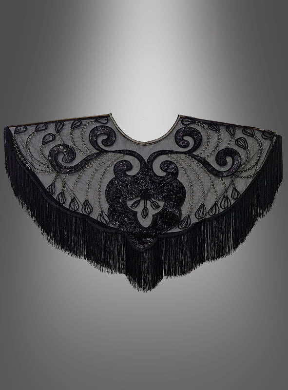 20er-Überwurf mit Fransen und Pailletten – ein schwarzer, halbkreisförmiger Schal mit kunstvoller Stickerei und glänzenden Pailletten, präsentiert vor einem grauen Farbverlauf. Dieses elegante Accessoire erinnert an ein Charleston-Kleid oder einen Überwurf aus den 20er Jahren und ist perfekt, um Ihr Flapper-Kostüm zu vervollständigen.