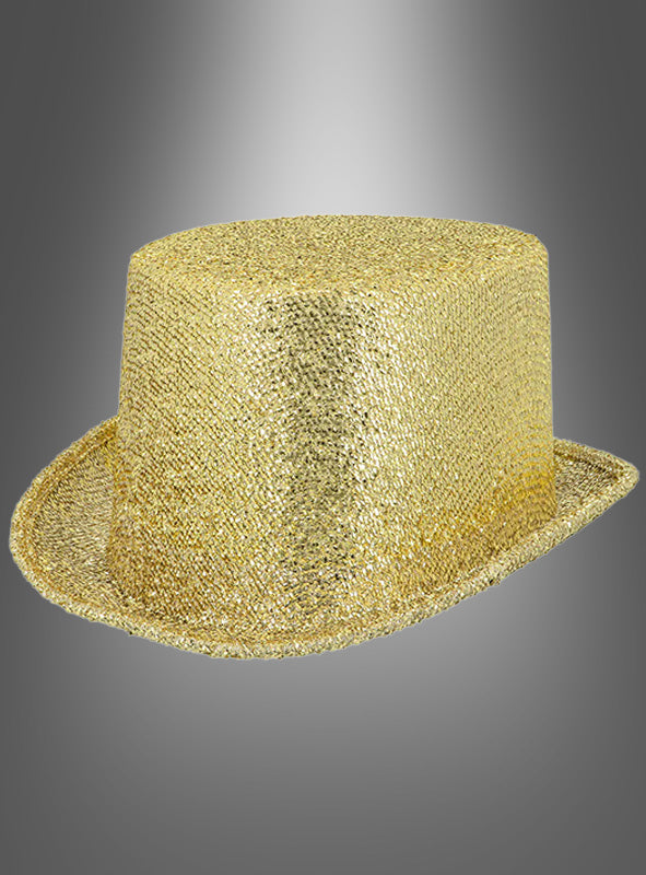 Ein glitzernder Zylinderhut in Gold, ideal für Ihr Karnevalskostüm oder Ihr Showtanz-Outfit, ist vor einem grauen Farbverlaufshintergrund abgebildet.