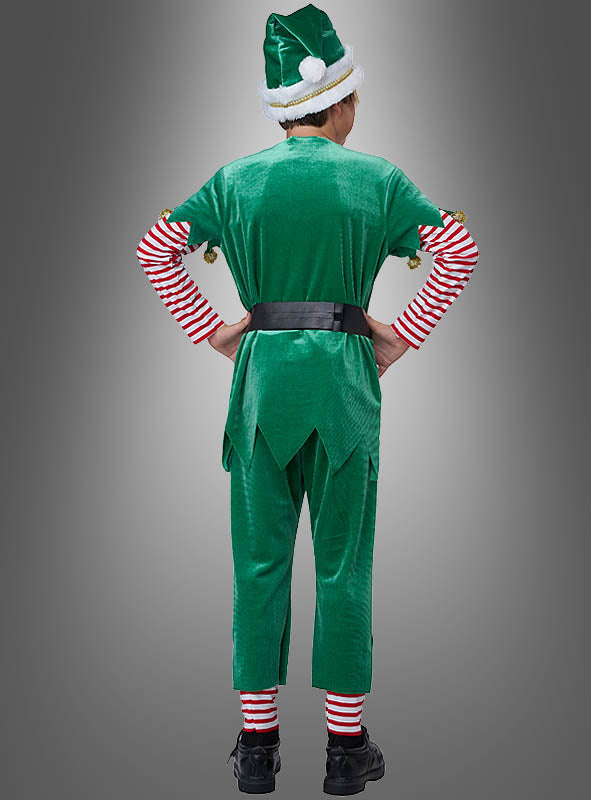 Eine Person steht mit den Händen in den Hüften da und trägt das „Grüner Weihnachtself“-Kinderkostüm mit rot-weiß gestreiften Ärmeln und Socken, einem schwarzen Gürtel und einer passenden Mütze; die Abbildung zeigt die Person von hinten vor einem grauen Hintergrund – ideal als Elfenkostüm für Jungen und Mädchen zu festlichen Anlässen.