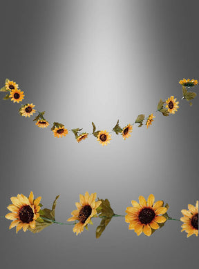 Zwei „Deko Sonnenblumen“-Girlanden (220 cm) mit grünen Blättern sind vor einem grau abgestuften Hintergrund abgebildet, wobei eine Girlande geschwungen und die andere gerade angeordnet ist. Diese festlichen Girlanden bestehen aus naturgetreuen Kunstblumen und sorgen für eine bezaubernde dekorative Note.