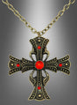 Die „Vampir Kette Gothic Kreuz aus Metall 6,5 cm“ besticht durch einen kunstvoll gearbeiteten schwarz-goldenen Anhänger, der mit leuchtend roten Edelsteinen verziert ist und sich vor einem grau abgestuften Hintergrund abhebt – ein dramatisches Statement-Stück für Liebhaber des markanten Gothic-Stils.