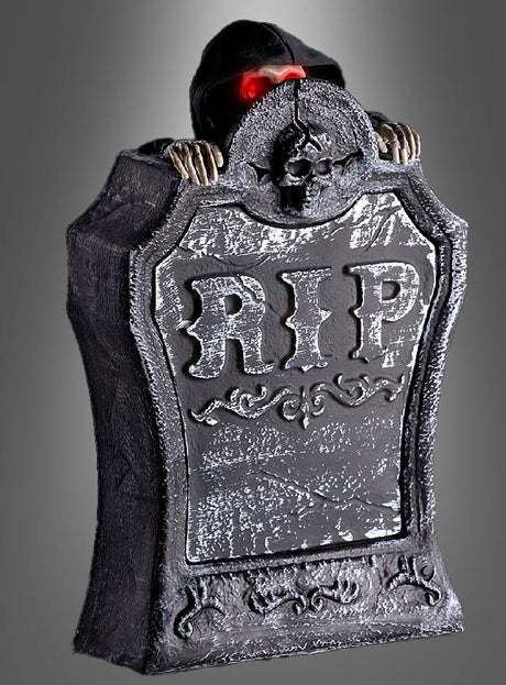 Der „Grabstein mit Skelett, Licht & Ton, 40 cm“ besteht aus einem Grabstein mit der Gravur „RIP“, der von einer Gestalt mit Kapuze, leuchtend roten Augen und Skeletthänden gehalten wird. Unheimliche Licht- und Soundeffekte erwecken ihn zum Leben und sorgen für eine authentisch gruselige Halloween-Atmosphäre.