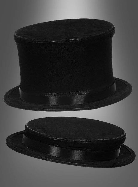 Zwei schwarze „Klappzylinder Chapeau Claque Deluxe“-Zylinder mit Satinbändern – einer aufrecht, der andere auf der Seite liegend – werden elegant vor einem grau verlaufenden Hintergrund präsentiert und sorgen so für eine klassische, zeitlose Inszenierung.