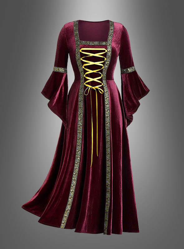 Ein langes, burgunderrotes „Mittelalterkleid Hildegard rot oder grün“ aus Samt mit ausgestellten Ärmeln, Goldbesatz und einer gelben Schnürung vorne (Kleid mit Schnürung) wird vor einem schlichten grauen Hintergrund präsentiert.