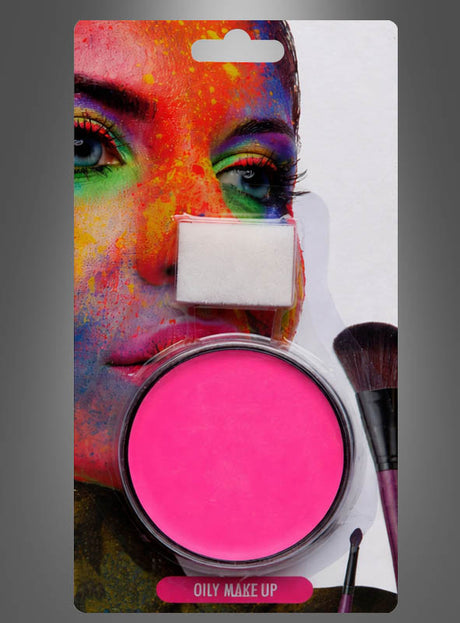 Auf der Verpackung ist eine Packung „Creme Make-up Pink mit Schwämmchen“ vor einem bunt bemalten Gesicht abgebildet. Das Produkt enthält rosa, cremiges Make-up mit einem Schwämmchen und einem Pinselapplikator und spiegelt damit perfekt den lebhaften Stil des K-Pop-Make-ups wider.