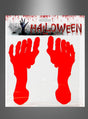 Ein Paket mit der Aufschrift „Blutige Fußabdrücke Halloween-Deko“ enthält zwei rote, fußförmige Dekorationen, die wie blutige Fußabdrücke auf grauem Hintergrund aussehen – perfekt als gruselige Halloween-Dekoration für Ihre nächste unheimliche Feier.