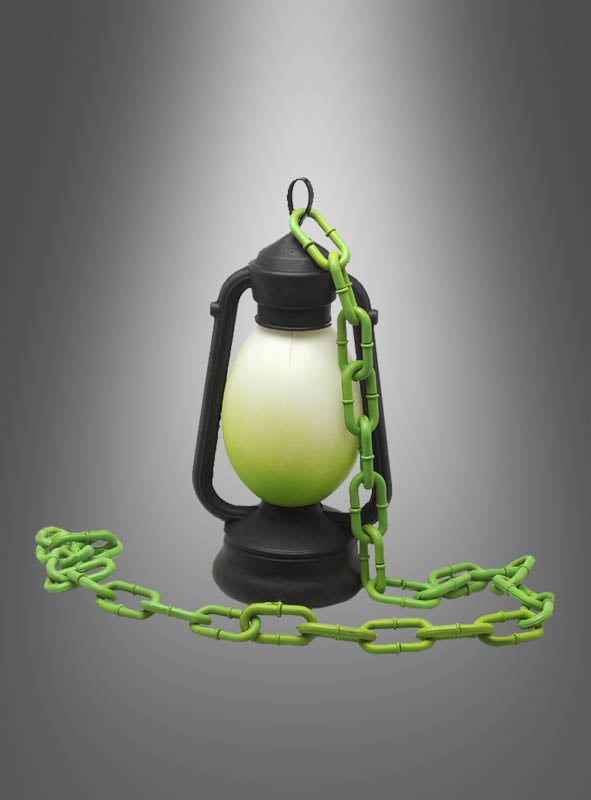 Eine „Magische Laterne“, 24 cm, grün, mit Licht, mit weißer Mitte und einer leuchtend magisch-grünen Kunststoffkette, die um sie herum und daneben gewickelt ist, vor einem grau verlaufenden Hintergrund.
