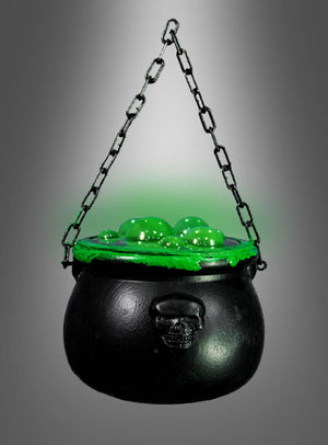 Magisch leuchtender Hexenkessel (17 x 20 cm) mit Totenkopf-Motiv, gefüllt mit leuchtend grüner Flüssigkeit und an einer schwarzen Kette vor einem grauen Farbverlauf hängend – eine auffällige Halloween-Dekoration, die jede Hexenparty perfekt ergänzt.