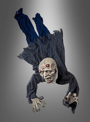 Ein „kriechender oder hängender Zombie, animiert mit Sound, 140 cm“ in zerfetzter schwarzer Kleidung, mit blassem Kopf, roten Augen und ausgestreckten Armen scheint vorwärts zu kriechen und sorgt vor einem grau verlaufenden Hintergrund für eine besonders gruselige Halloween-Dekoration.