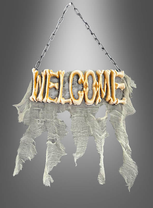Heißen Sie Ihre Gäste mit dem Halloween-Türschild „Welcome“ (28 x 40 cm) willkommen – einem auffälligen Schild mit der Schriftzug „WELCOME“ in leuchtendem Gelb, das an einer Kette befestigt ist und unter dem zerfetzte graue Stoffstreifen herabhängen. Dieses gruselige Schild ist das perfekte Halloween-Dekostück, um direkt an Ihrer Haustür für festliche Stimmung zu sorgen.