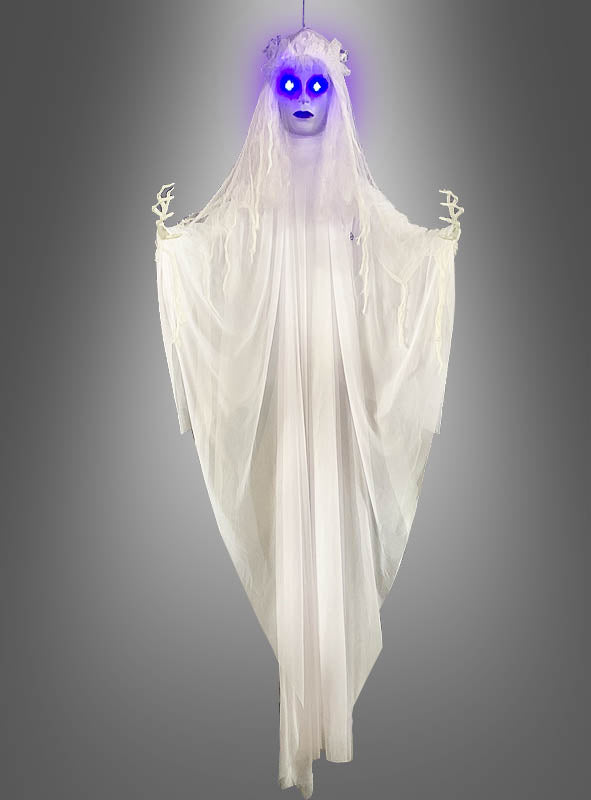 Eine geisterhafte Gestalt mit leuchtend blauen Augen, weißem, drapiertem Gewand und skelettartigen Händen, die vor einem grauen Hintergrund schwebt – diese „Geisterbraut mit Licht und Sound“ (183 cm) ist die perfekte Halloween-Dekoration, um eine unheimliche Atmosphäre zu schaffen.