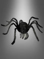 Eine springende Spinne (70 x 50 cm) in Schwarz mit acht Beinen und sichtbaren Fangzähnen wird vor einem grauen Farbverlauf präsentiert – ideal als Halloween-Dekoration oder für deine eigene Inszenierung mit einer animierten Riesenspinne.