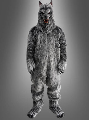 Eine Person trägt das 6-teilige Werwolf-Kostüm „Fellanzug Deluxe“ – ein beeindruckendes Ganzkörper-Wolfskostüm mit spitzen Ohren, Krallenfüßen und einer knurrenden Wolfsmaske – und steht vor einem schlichten Hintergrund mit Farbverlauf. Dieses hochwertige Tierkostüm für Erwachsene ist eine hervorragende Wahl für alle, die auf der Suche nach einem auffälligen Werwolf-Kostüm für Herren sind.