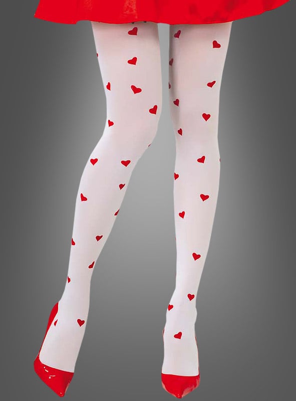 Vor einem schlichten grauen Hintergrund steht eine Frau, die eine weiße Strumpfhose mit roten Herzmustern trägt, dazu rote High Heels und einen roten Rock. Dieses bezaubernde Karnevalsaccessoire verleiht ihrem festlichen Look eine verspielte Note.