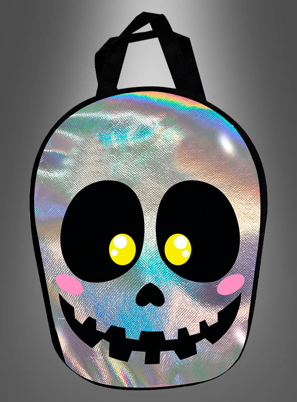 Ein glänzender, schillernder Rucksack „Halloween-Tasche mit schillerndem Totenkopf“ mit einem Comic-Totenkopfgesicht mit großen schwarzen, gelb hervorgehobenen Augen, rosa Wangen und einem breiten, zahnreichen Lächeln – perfekt als verspieltes Kinder-Accessoire oder als auffällige Halloween-Tasche.