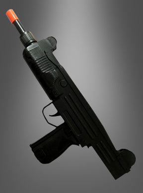 Die „Uzi 9 mm Maschinenpistole Gangsterwaffe“ – eine schwarze Spielzeugpistole mit orangefarbener Spitze, die an eine Uzi 9 mm erinnert – ist vor einem grauen Hintergrund mit Farbverlauf abgebildet und damit das perfekte Accessoire für dein Gangster-Kostüm.