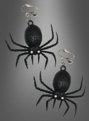 Zwei schwarze Spinnen-Ohrringe – Halloween-Schmuck in Form von Spinnen mit silbernen Clipverschlüssen – werden vor einem grau abgestuften Hintergrund präsentiert – perfekt als gruselige Ohrringe für deine nächste Halloween-Party.