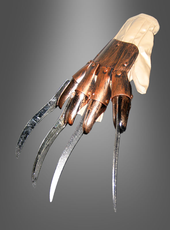 Nightmare Handschuh mit Klingen – ein Handschuh mit Metallklingen an den Fingern und einem hölzernen Handrücken, inspiriert von klassischen Klingenhandschuh-Requisiten, vor einem grauen Hintergrund mit Farbverlauf – das perfekte Horrorfilm-Accessoire für alle Fans legendärer Slasher-Filme.