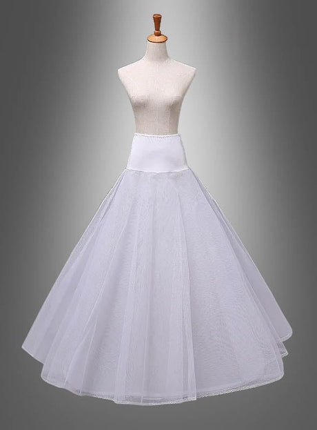 Eine weiße Schaufensterpuppe präsentiert den „Langer Reifrock Petticoat“ mit einem eng anliegenden Bund und einem ausgestellten Tüllrock vor einem grau verlaufenden Hintergrund.