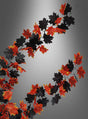 Herbstblätter-Girlande 200 cm, orange-schwarz, mit einer Mischung aus orangefarbenen und dunklen Blättern, die an schlanken Stielen angeordnet sind und sich vor einem neutralen grauen Hintergrund abheben – ideal als elegante Herbstdekoration für Ihr Zuhause.