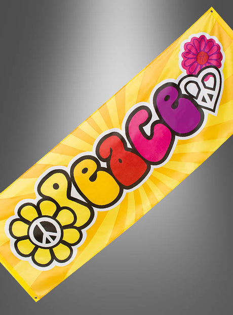 Das riesige Banner „Hippie Peace“ (220 x 74 cm) zeigt das Wort „PEACE“ in leuchtenden Farben auf gelbem Hintergrund, verziert mit einem Peace-Zeichen in einer Blume und einer weiteren Blume in der oberen rechten Ecke – ein ideales Accessoire, um jeder Flower-Power-Party einen Retro-Touch zu verleihen.