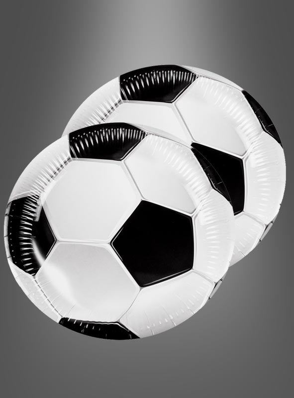 Die Pappteller „Fußball“ (10 Stück) im klassischen Schwarz-Weiß-Design eines Fußballs sind überlappend auf einem grauen Hintergrund mit Farbverlauf angeordnet – perfekt als Fußball-Dekoration für deine nächste Fußballparty.