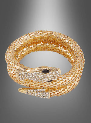 Schlangen-Armschmuck: Ein goldenes Armband in Schlangenform mit strukturierten Schuppen, Kristallakzenten am Kopf und Augen aus schwarzen Edelsteinen, das sich elegant vor einem grauen Hintergrund mit Farbverlauf windet – ein auffälliges Schlangenarmband, das sich perfekt als Kleopatra-Accessoire oder als markantes Statement-Stück im Kostümschmuck-Stil eignet.