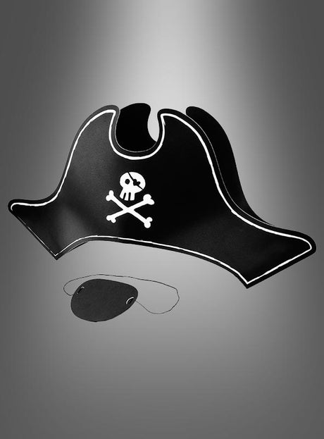 Das „Piraten-Papierhut-Partyset mit Augenklappe“ besteht aus einem schwarzen Piraten-Papierhut, der mit einem weißen Totenkopf verziert ist, sowie einer passenden schwarzen Augenklappe an einem elastischen Band – ideal für jeden Piraten-Kindergeburtstag oder als Teil Ihres nächsten Piraten-Partysets. Beide Artikel sind auf einem schlichten grauen Hintergrund abgebildet.