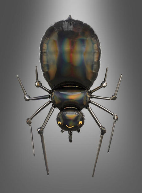 Ein metallischer, spinnenförmiger Ballon mit einer glänzenden, regenbogenfarbenen Oberfläche schwebt vor einem grauen Hintergrund mit Farbverlauf – perfekt als „Aufblasbare Spinne 101 cm Folienballon als Halloween-Deko“ für Ihre nächste Halloween-Party.