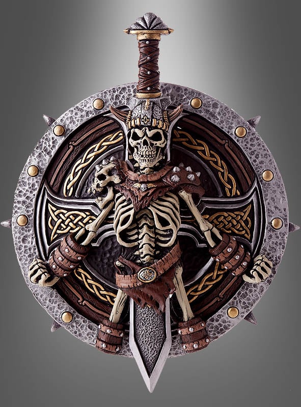 Ein dekoratives „Wikinger Schild und Schwert“ (48–58 cm) zeigt eine detailgetreue Skelettfigur in einer Rüstung im Wikinger-Stil, hinter der ein Schwert verläuft, während der Schild mit nordischen Mustern verziert ist – perfekt als Teil eines jeden Waffensets.