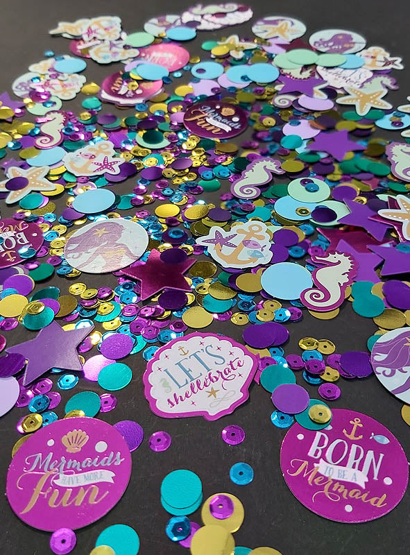 Meerjungfrau-Konfetti-Mix als Tischdekoration: Bunte, von Meerjungfrauen inspirierte Streudekoration mit Pailletten und runden Papierkonfettis, verziert mit Meerjungfrauen-Motiven und Sprüchen – ideal als bezaubernde Meerjungfrauen-Tischdekoration für Ihre nächste Feier.