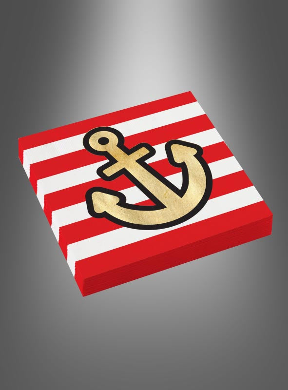 Ein Stapel „Gestreifte Servietten Piratenparty“ im Format 33 x 33 cm mit kräftigen roten und weißen Streifen und einem auffälligen goldenen Anker in der Mitte – ideal für einen Kindergeburtstag oder zur Aufwertung Ihrer Piratendekoration –, dargestellt vor einem grauen Hintergrund mit Farbverlauf.