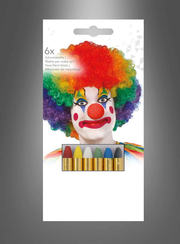Auf der Verpackung des 6er-Sets „Schminkstifte für Make-up“ ist ein Clown mit Regenbogenhaaren und Gesichtsbemalung über sechs farbigen Schminkstiften abgebildet – gelb, rot, weiß, blau, grün und schwarz –, ideal für jedes Schminkstift-Set oder jeden Karnevals-Make-up-Look.