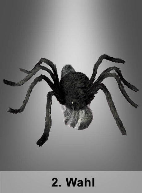 Eine schwarze, animierte Spinne mit den Maßen 70 x 50 cm („2. Wahl Springende Spinne“) und sichtbarem Spinnennetz ist vor einem grauen Hintergrund mit Farbverlauf zu sehen, wodurch eine gruselige Szene entsteht, die sich ideal für die Halloween-Dekoration eignet. Der Text „2. Wahl“ ist am unteren Bildrand zu sehen.