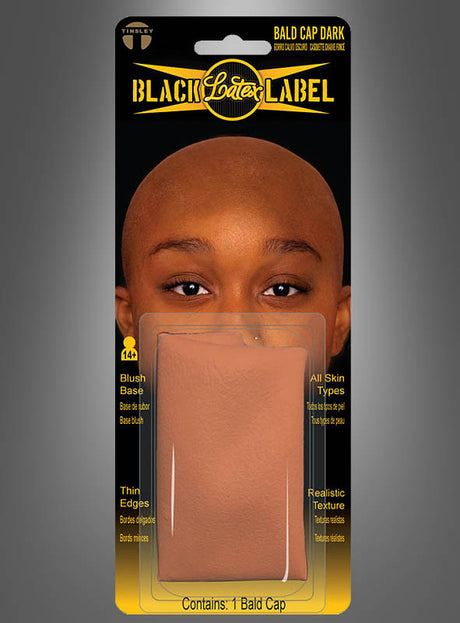Verpackung mit einer Latex-Glatzenkappe „FX Film Glatze“ von Tinsley Transfers, beschriftet mit „Black Label Latex“ und mit einem Bild einer Person, die die Kappe trägt. Zu den hervorgehobenen Merkmalen gehören dünne Ränder, eine realistische Textur und die Eignung für alle Hauttypen.